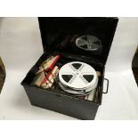 LARGE METAL TIN CONTAINING OVER 20 MIXED VINTAGE FILMS ON REELS,