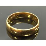 A GENTS 22CT WEDDING BAND withdrawn