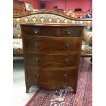 A REPRODUCTION SMALL THREE DRAWER BOW FRONT CHEST WITH LIFTING TOP
