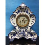EARLY 20TH CENTURY DELFT BLUE AND WHITE MANTLE CLOCK WITH BELL CHIMING MOVEMENT