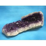 A LARGE AMETHYST CRYSTAL