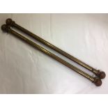 PAIR OF ANTIQUE WOODEN CURTAIN POLES WITH BRASS TRACKS