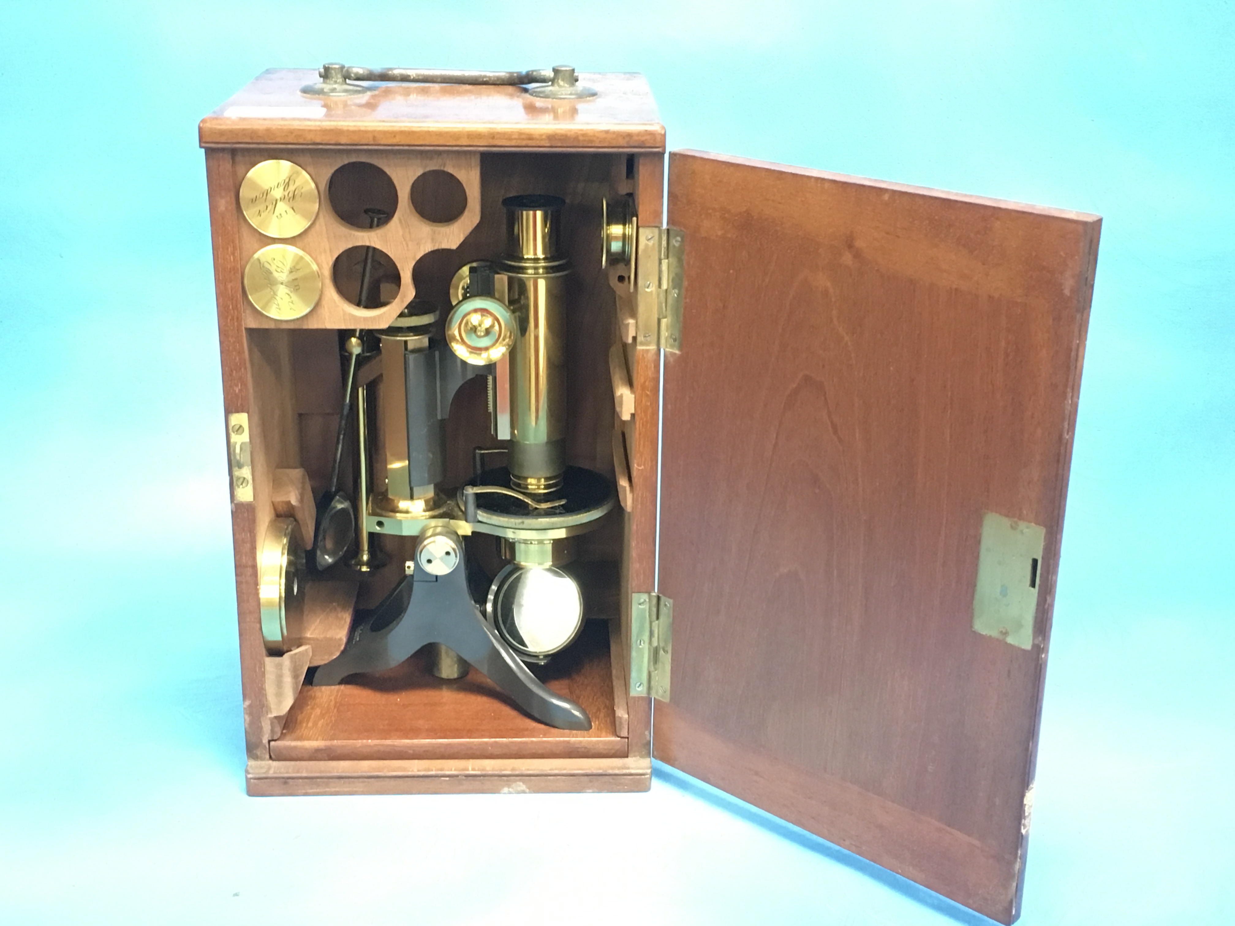 BRASS CASED MICROSCOPE WITH ACCESSORIES IN ORIGINAL FITTED MAHOGANY CASE BY BAKER LONDON