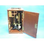 BRASS CASED MICROSCOPE WITH ACCESSORIES IN ORIGINAL FITTED MAHOGANY CASE BY BAKER LONDON