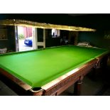 AN EARLY 20TH CENTURY MAHOGANY FULL SIZE SNOOKER TABLE BY BURROUGHES AND WATTS, 19 SOHO SQUARE,