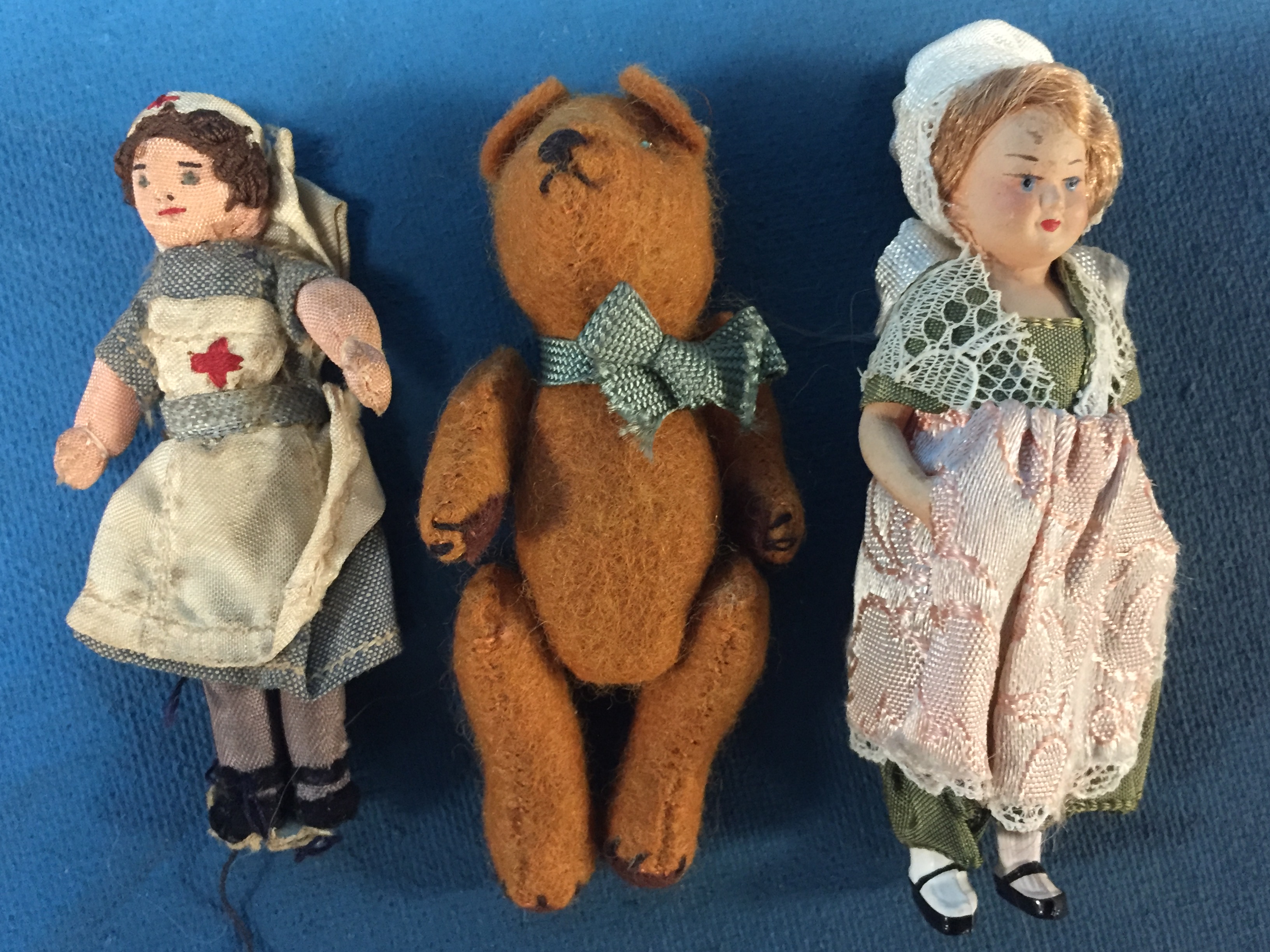 FOUR VICTORIAN MINIATURE PORCELAIN HEADED DOLLS AND A SMALL TEDDY AND MINIATURE CLOTH NURSE DOLL - Image 4 of 4