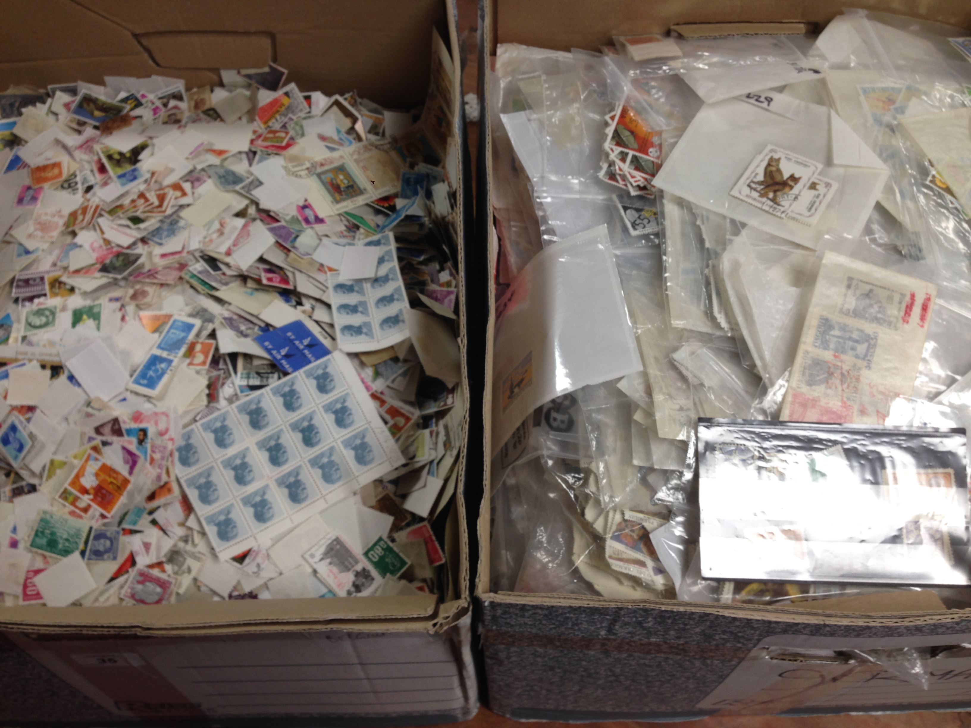 TWO LARGE BOXES WITH ALL WORLD LOOSE STAMPS,