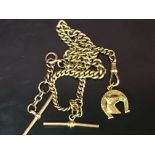 A 9CT GOLD WATCH CHAIN WITH TWO BARS, ALONG WITH 9CT GOLD HORSESHOE CHARM,