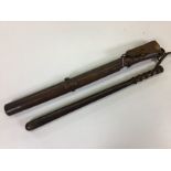 VICTORIAN MOUNTED POLICE TRUNCHEON IN LEATHER CASE,
