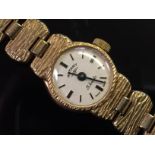 LADIES 9CT GOLD ROTARY BRACELET WATCH, 21 JEWEL MOVEMENT, BARK FINISH PANEL LINKED BRACELET,