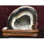 MOUNTED POLISHED AGATE SAMPLE WITH CRYSTAL CENTER