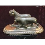 A BRONZE TIGER PAPER WEIGHT PROBABLY ORIENTAL