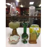 VICTORIAN SMALL FORM GILT OIL LAMP WITH GREEN GLASS FONT AND ART GLASS VASE BEARING LUNDBERRY