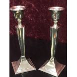 A PAIR OF SILVER 18CM SLENDER CANDLE STICKS BIRMINGHAM ASSAY