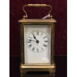 A FRENCH FOUR GLASS BRASS CARRIAGE CLOCK,