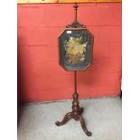 A VICTORIAN ROSEWOOD PEDESTAL POLE SCREEN WITH GLAZED EMBROIDERED PANEL