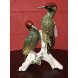 A CONTINENTAL HARD PASTE MODEL OF TWO GREEN WOODPECKERS