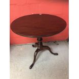 A GEORGE III AND LATER CIRCULAR MAHOGANY TEA TABLE ,