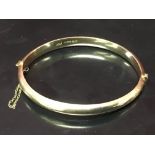 A 9CT GOLD BANGLE,