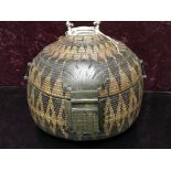 ANTIQUE INDIAN WOVEN SNAKE BASKET WITH DECORATIVE WOVEN PATTERN.