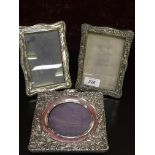 THREE SILVER PHOTOGRAPH FRAMES TO INCLUDE TWO RECTANGULAR AND ONE CIRCULAR