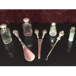 4 SILVER TOPPED BOTTLES, SILVER HANDLED GLOVE STRETCHERS,