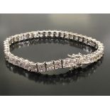 TOP QUALITY TENNIS BRACELET BY DIAMOND FIRE WITH HIDDEN INTEGRAL CLASP.