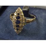 A SAPPHIRE AND DIAMOND RING OF NAVETTE FORM,