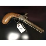 A DOUBLE BARRELLED PERCUSSION PISTOL WITH MAHOGANY GRIP. OVERALL LENGTH 23CM.