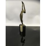 AN ART DECO BRONZE FIGURE OF A FEMALE DANCER STAMPED LOKLINZL 20CM ON BLACK AND ONYX PLINTH