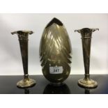 A PAIR OF SILVER TRUMPET VASES 17CM ALONG WITH A DESIGNER EGG SHAPED VASE MARKED 900