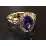 9CT GOLD TANZANITE RING WITH CERTIFICATE,