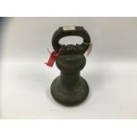 A 56LB BRONZE LOCAL STANDARD BELL WEIGHT ENGRAVED COUNTY OF DEVON DATED 1879 E.V.D.
