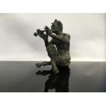 BRONZE FINISH MYTHOLOGICAL HORNED MALE FIGURE WITH CLOVEN FEET, BEARING SIGNATURE W.