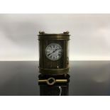 BRASS AND CARRIAGE CLOCK WITH PAINTED PORCELAIN PANELS,