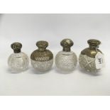 4 SILVER TOPPED CUT GLASS SCENT BOTTLES