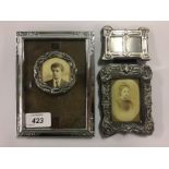 FOUR ASSORTED SILVER PHOTOGRAPH FRAMES
