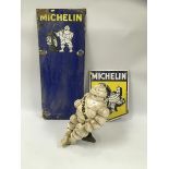 2 MICHELIN ENAMEL SIGNS 83 X 35CM, 42 X 31 (SHIELD SHAPE) ALONG WITH 'MICHELIN MAN' FIGURE,