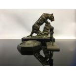 A CAST METAL LIONESS ON ROCK MOUNTED ON MARBLE PLINTH 14CM,
