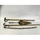 A PAIR OF HORN HANDLE WALKING CANES EACH WITH SPIKE END ALONG WITH CARVED WALKING STICK AND SILK
