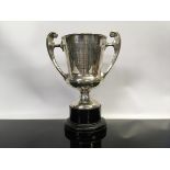 SILVER TWO HANDLED PRESENTATION CUP ON STAND