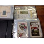 A COLLECTION OF GREETINGS CARDS AND POSTCARDS IN FOUR ALBUMS