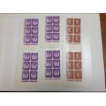 GB: STOCKBOOK WITH A COLLECTION OF WILDING CYLINDER BLOCKS,