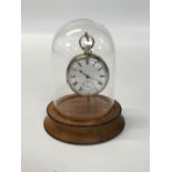 GLASS DOME POCKET WATCH STAND WITH SILVER CASED POCKET WATCH HALLMARKED BIRMINGHAM 1886 (WATCH KEY