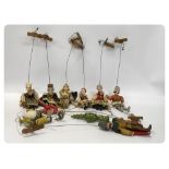 A COLLECTION OF 12 PUPPETS BELIEVED TO BE FROM A MECHANICAL ORGAN OR SIMILAR