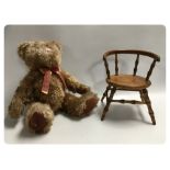 A DOLL'S CAPTAINS CHAIR TURNED WITH BAMBOO EFFECT ALONG WITH A GREGORY BEAR FOR DISPLAY ONLY