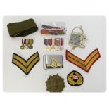 TUB MILITARIA TO INCLUDE HELMET PLATE, MINIATURE MEDALS, CLOTH RANK MARKINGS,