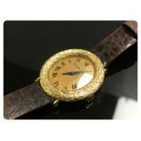 LADIES WRIST WATCH MARKED 18K WITH BARK EFFECT FRONT.