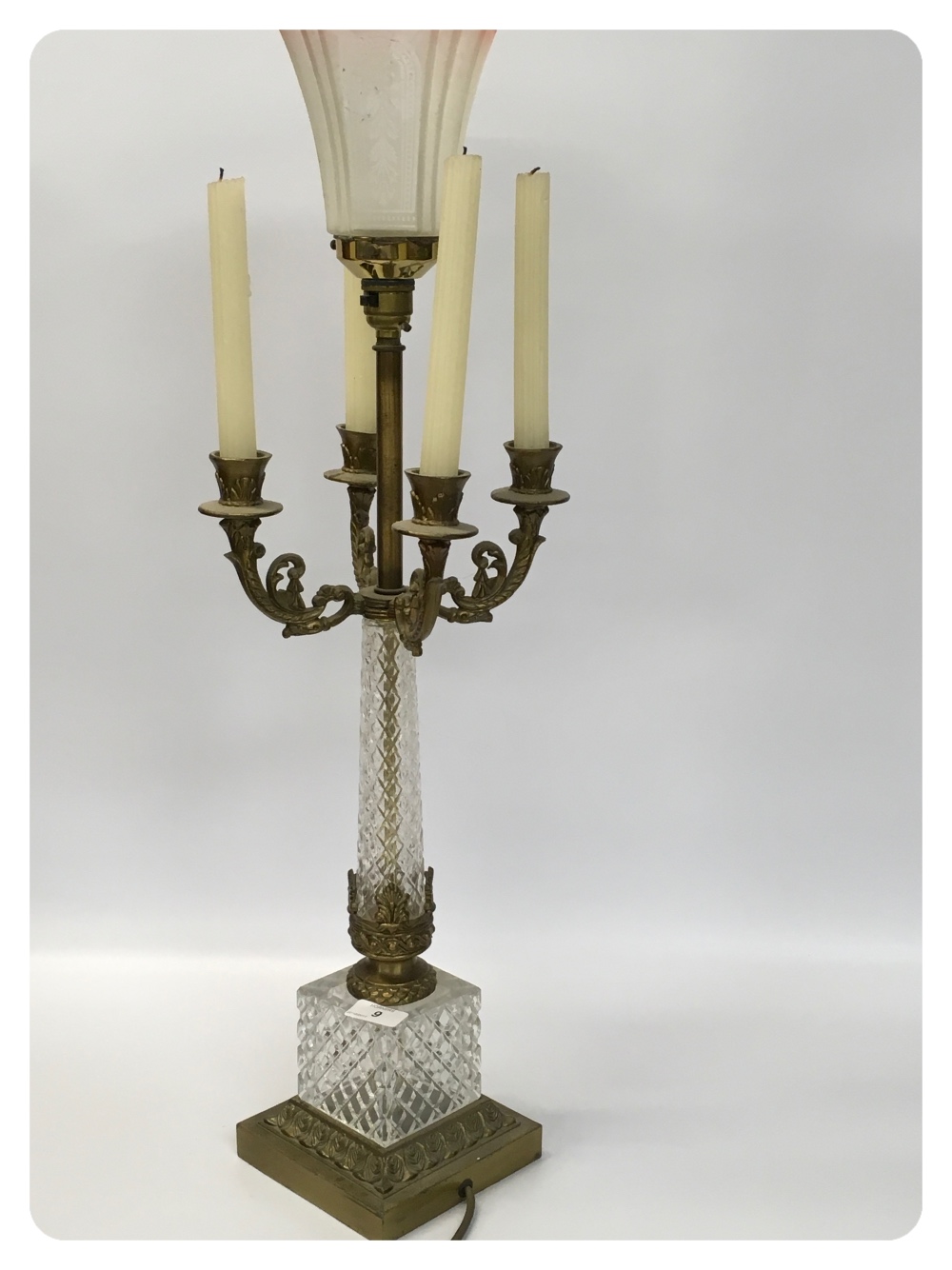 A FRENCH GLASS AND GILT METAL TABLE LAMP WITH FOUR BRANCH CANDLE HOLDER