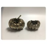 2 UNUSUAL WHITE METAL SQUASHED GOURD SHAPED TRINKET BOXES BEARING INDISTINCT MARKS TO BASE